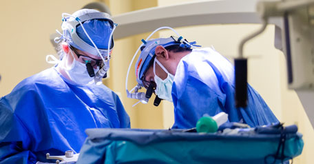 UVA transplant surgeons operating on a patient.