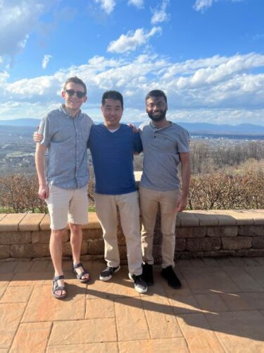 University of Virginia Allen Luk, MD, Surgery Resident smiles with friends at Carter Mountain