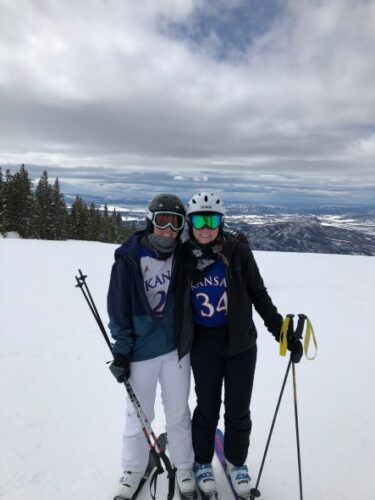 University of Virginia Emily Jordan, MD, Surgery Resident skis with a friend