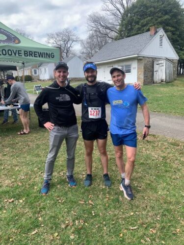 University of Virginia William Plautz, MD, Surgery Resident smiles with friends at a run.